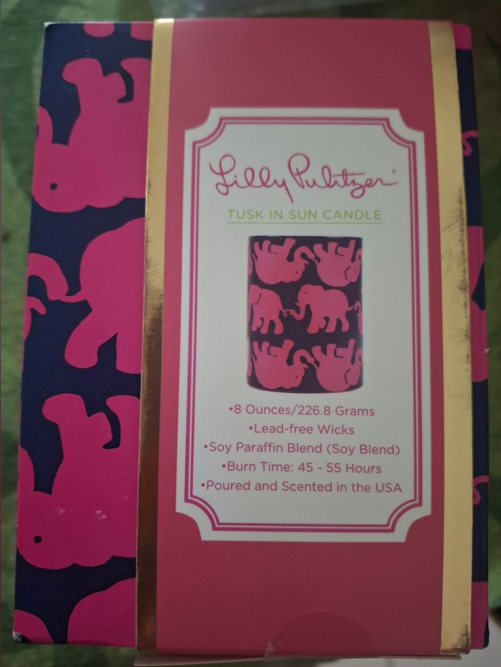 Lilly Pulitzer Pink and Navy Elephant Candle Packaging with Gold Accents
